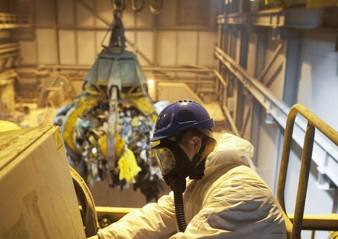 A person wearing safety gear at a Konecranes facility.